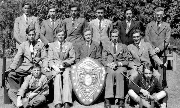 Trophies, guns and lots of Brylcreem... its the RGS 1948 shooting team.
