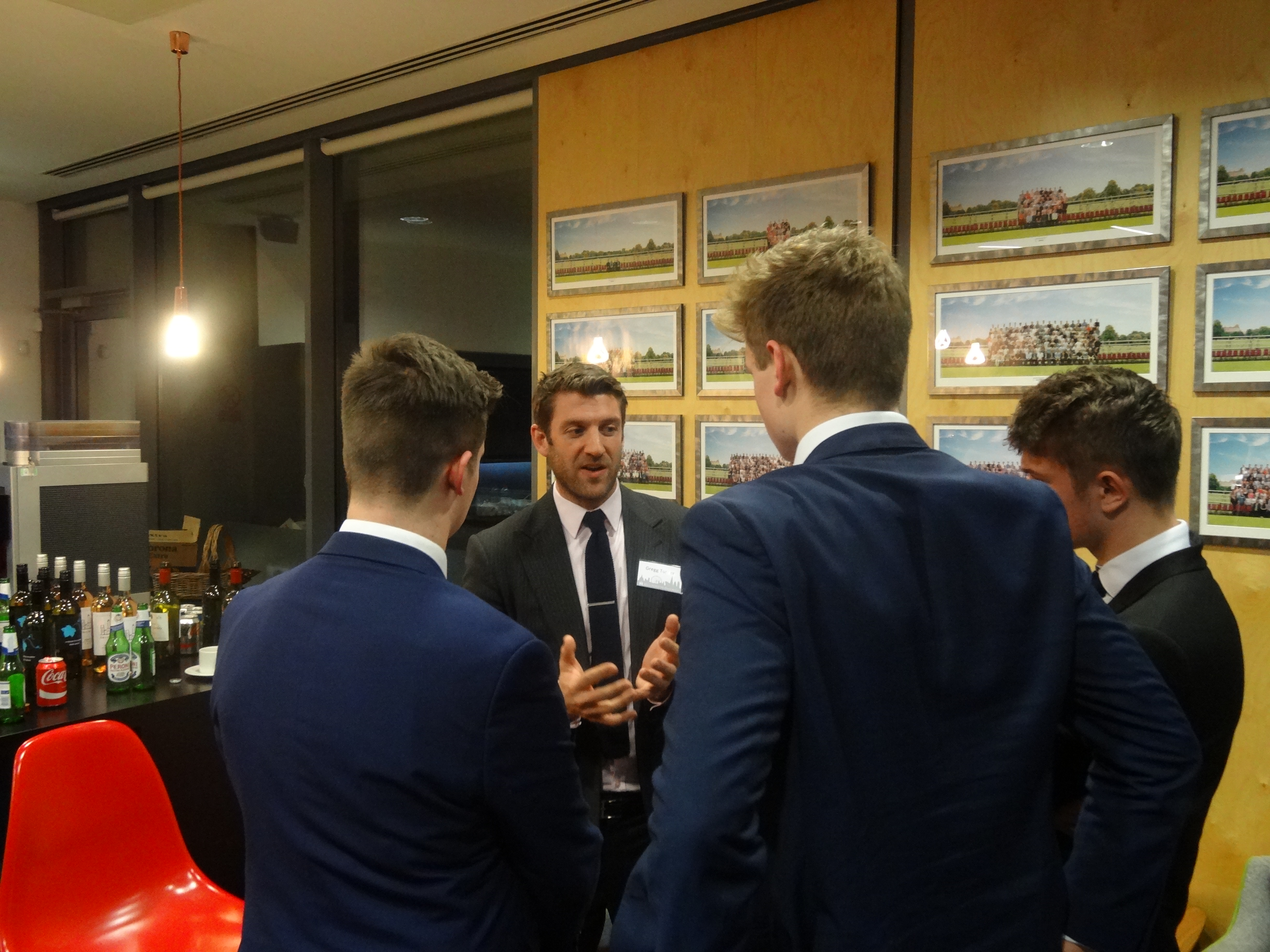 Gregg Turner ('95) chatting with Sixth Form